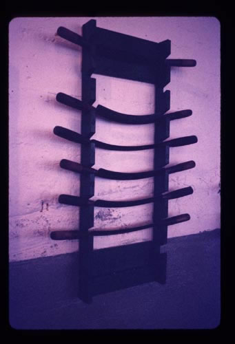Photo of blubbering knives hanging on the wall.