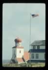 Thumbnail photo of church steeple, Company House, and the flag pole.