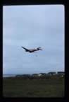 Thumbnail photo of airplane dropping a mail package.