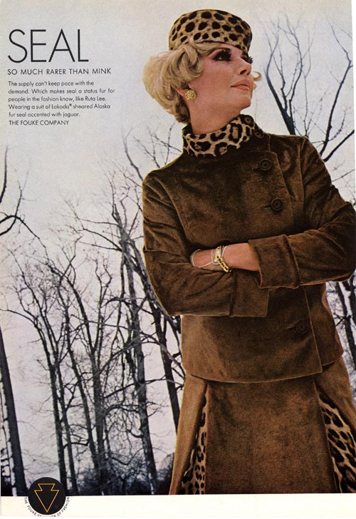 Advertisement illustration of woman in brown fur jacket and skirt trimmed in leopard skin with message "Fur seal, so much rarer than mink."  