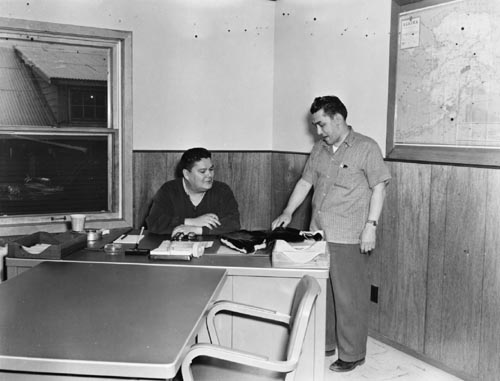 Photo of Eaneau and Iliodor Merculieff in the Bureau of Commercial Fisheries Office.