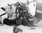 Thumbnail photo of wrecked airplane in the snow.