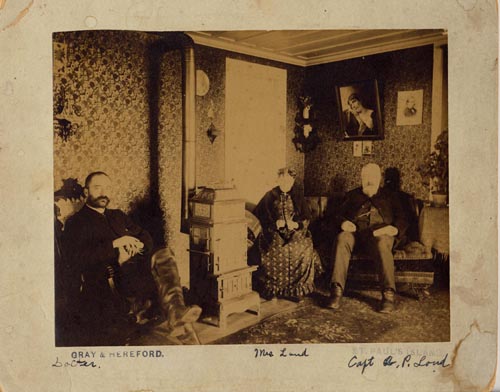Photo of the inside of the Government House (pictured are a doctor, Captain A.P. Loud, and Mrs. Loud).