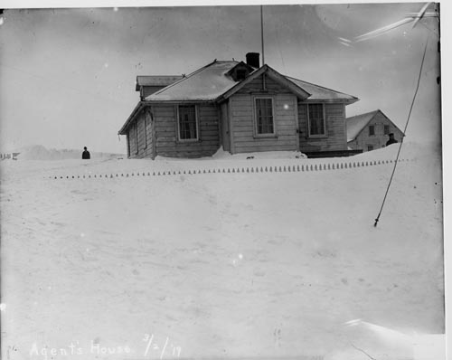 Photo of house in snow.
