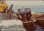 Thumbnail photo of men loading truck on baidar.