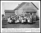 Thumbnail photo of St. George schoolchildren outside the schoolhouse.