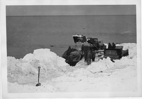 Photo of men unloading cargo from the Penguin.