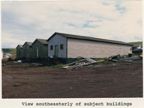 Photo of southeasterly view of four warehouse buildings, lots 12 and 13 of Tract 43.