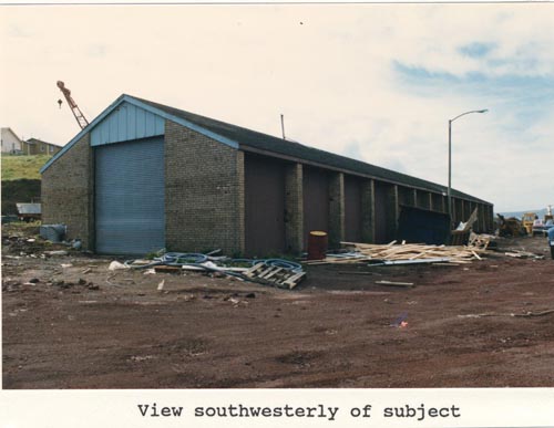 Photo of southwesterly view of the Equipment storage shed, lot 14 of Tract 43.