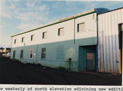 Photo of westerly view of the north elevation of the Machine Shop adjoining the new addition.
