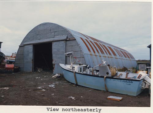 Photo of northeasterly view of the Quonset Building.