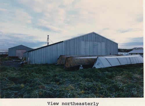 Photo of northeasterly view of the Combine Shop.