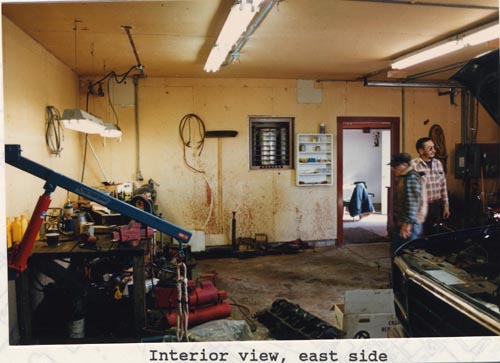 Photo of the interior of the east side of a five car garage.