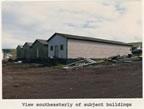 Thumbnail photo of southeasterly view of four warehouse buildings, lots 12 and 13 of Tract 43.