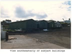 Thumbnail photo of southwesterly view of four warehouse buildings, lots 12 and 13 of Tract 43.