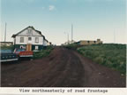Thumbnail photo of northeasterly view of the road frontage of Cottage E.