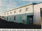 Thumbnail photo of westerly view of the north elevation of the Machine Shop adjoining the new addition.