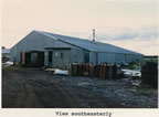 Thumbnail photo of southeasterly view of the Combine Shop.