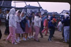 Thumbnail photo of girls preparing for a race.
