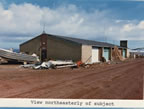 Thumbnail photo of northeasterly view of the Tanaq Carpenter Shop, lot 19 of Tract 43.