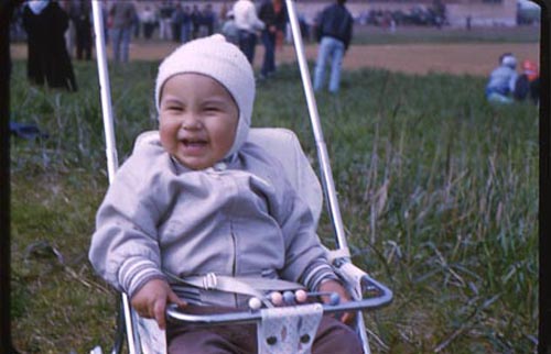 Photo of baby in stroller.