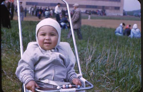 Photo of baby in stroller.