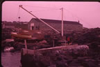 Thumbnail photo of the native boat house.