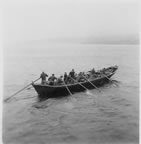 Thumbnail photo of men rowing a baidar.