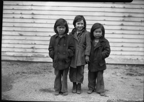 Photo of Three Aleut girls; middle girl is Mary Shaishnikoff.