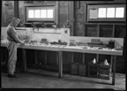 Thumbnail photo of man in laboratory (basement of old government office).