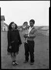 Thumbnail photo of man, woman, and young child.