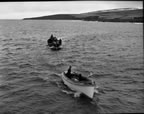 Thumbnail photo of boat being towed.