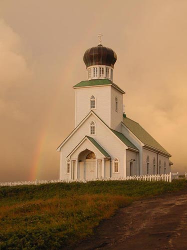 Photo of Russian Orthodox Church with a rainbow.