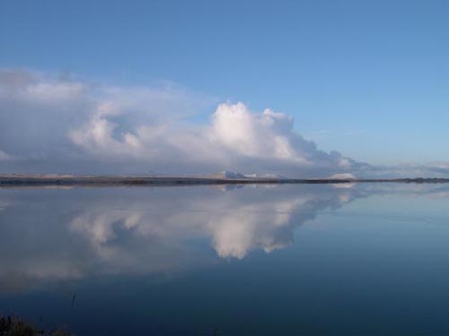 Photo of reflection of clouds on Big Lake.