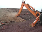 Thumbnail photo of an excavator sampling at the Enhanced Thermal Conduction Unit.
