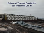 Thumbnail photo of people standing on the long building of the Enhanced Thermal Conduction unit.