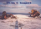 Thumbnail photo of large rusted metal objects in snow at "Boneyard B".