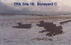 Thumbnail photo of large rusted metal objects in the snow at "Boneyard C".