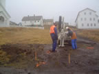 Thumbnail photo of two people geoprobing at the Old Carpenter Shop.