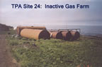 Thumbnail photo of rusted tanks at the Inactive Gas Tank Farm.