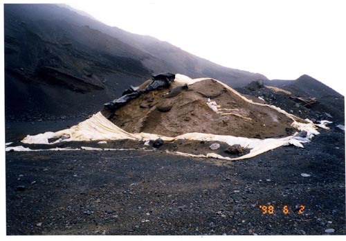 Photo of petroleum contaminated soil stockpile near the Polovina Hill quarry.