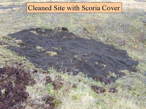 Photo of the battery debris site at Southwest Point after site remediation showinf cleaned site with Scoria cover.