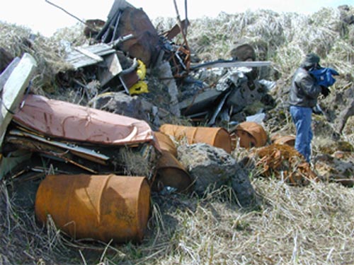Photo of drums and metal debris in St. Paul Landfill Cell A.