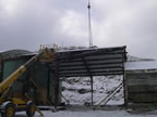 Thumbnail photo of the Tract 46 Sheet Metal Garage during demolition.