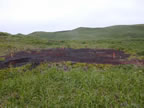 Thumbnail photo of Scoria pad at the Oil Drum Dump Site.