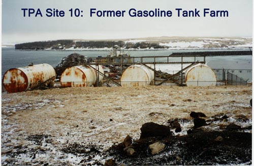 Photo of four large tanks at former gasoline tank farm.