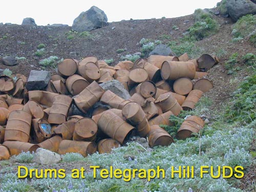 Photo of old rusted drums at Telegraph Hill (FUDS).