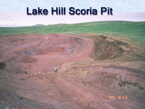 Photo of Lake Hill Scoria Pit, an open expanse of red dirt.