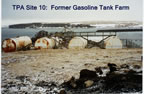 Thumbnail photo of four large tanks at former gasoline tank farm.