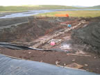 Thumbnail photo of a large pit filled with equipment.